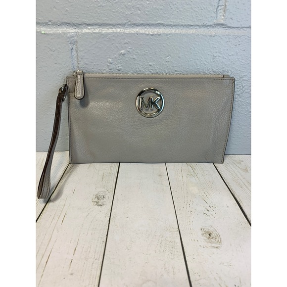 Michael Kors Handbags - Michael Kors Grey Pebbled Leather Wristlet Clutch Silver MK Logo Medallion